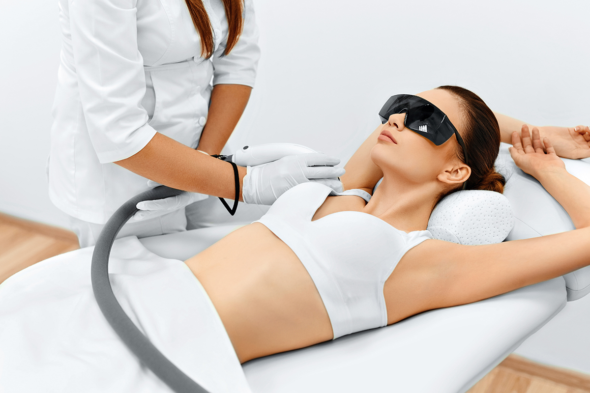 Woman doing laser hair removal inside the clinic