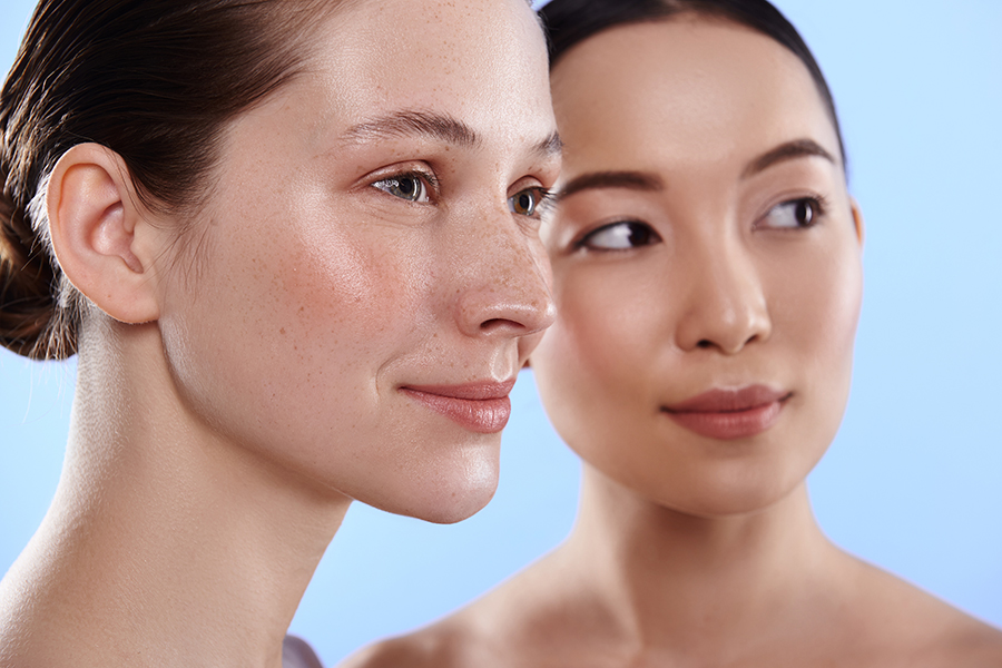 Close up of interracial pretty women with different types of skin